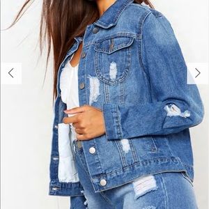 Oversized distressed denim jacket